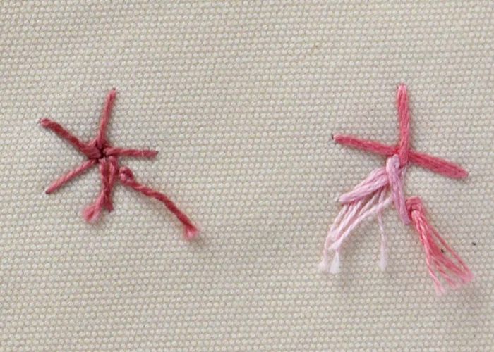 Flores tejidas a punto de rueda de araña algodón rosa perla e hilo abigarrado, revés