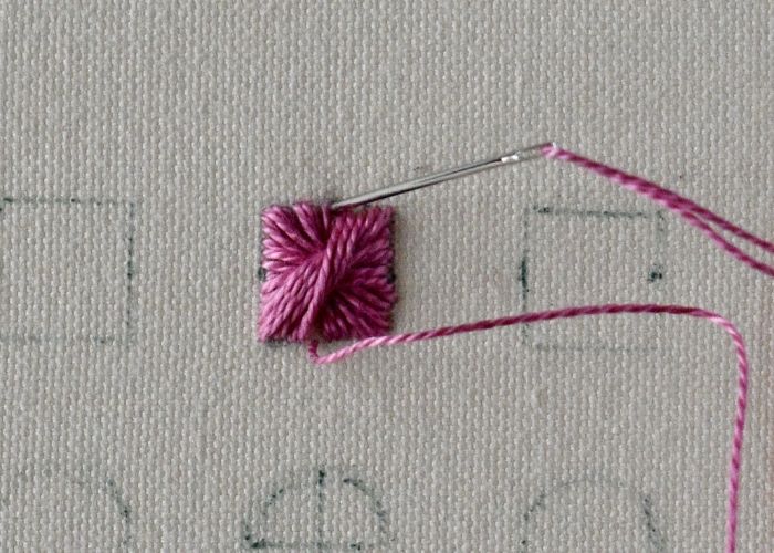 Make the final stitch to close the last gap between stitches and secure the thread on the back side of the embroidery.