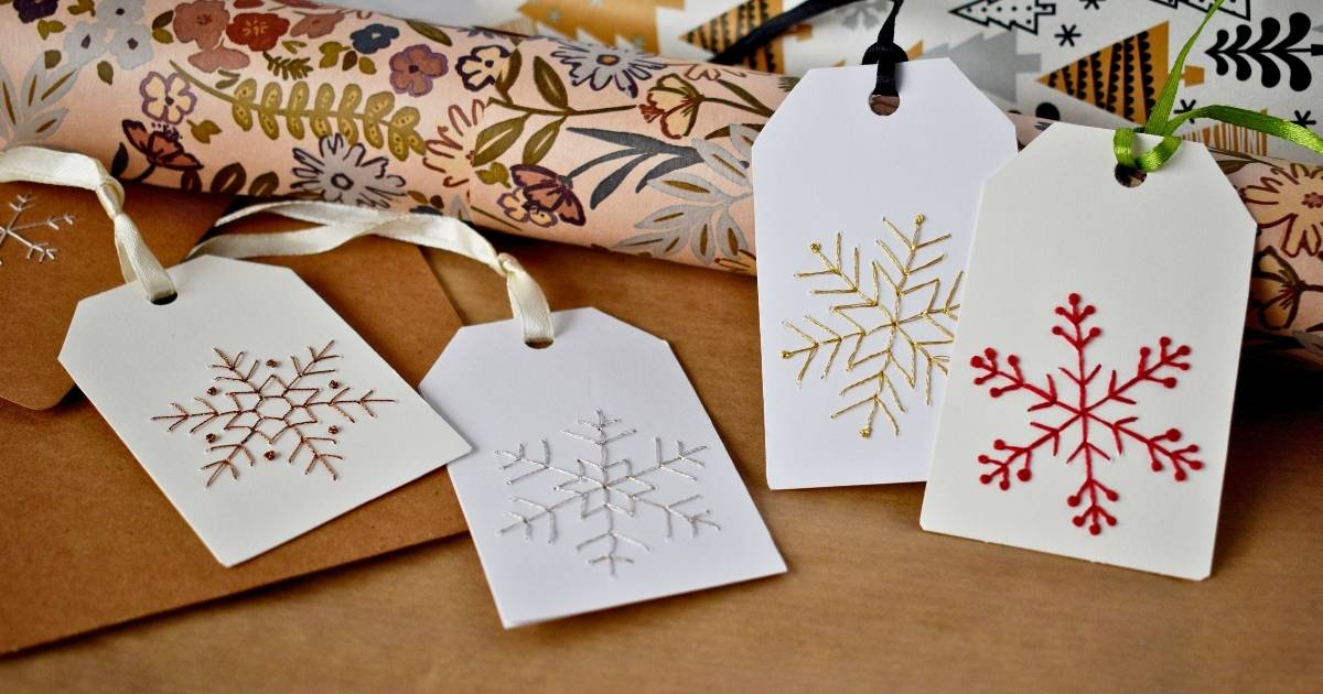 DIY Weihnachtsetiketten mit gestickten Schneeflocken - Schritt-für-Schritt-Anleitung und kostenlose PDF-Vorlagen Unternehmensbild